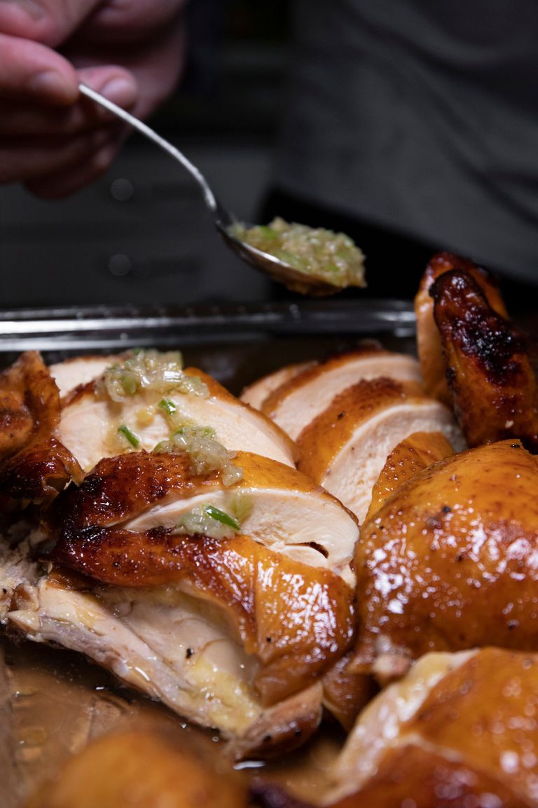 Sliced sous vide bone-in turkey breast with crisp golden skin