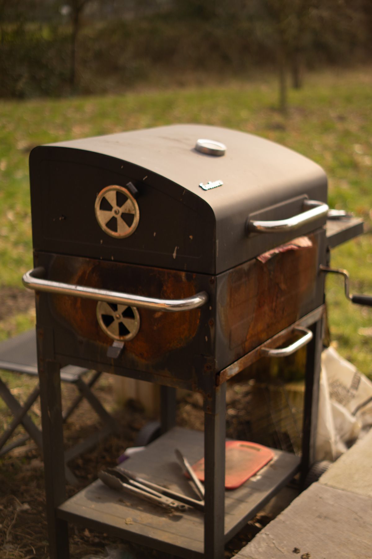 A backyard barbecue grill set up for cooking