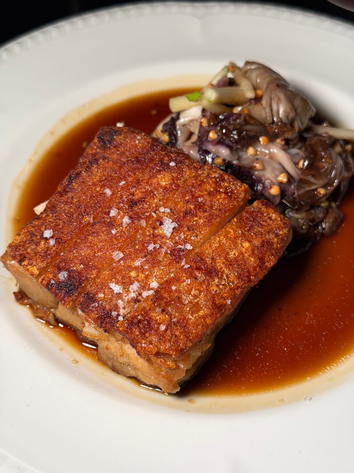 Sliced crispy roast pork belly with crackling skin