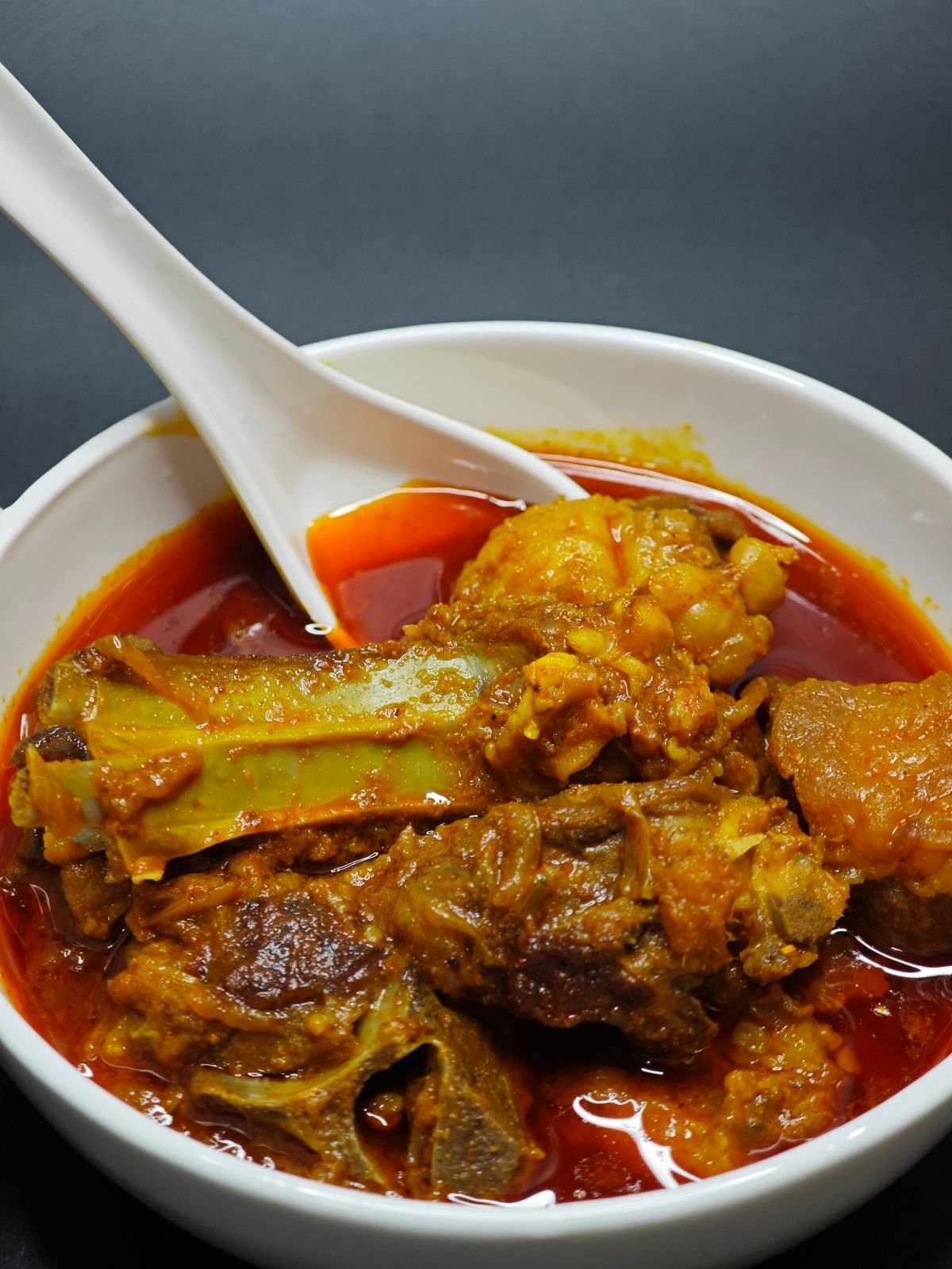 Jamaican curry goat in a rich golden curry sauce