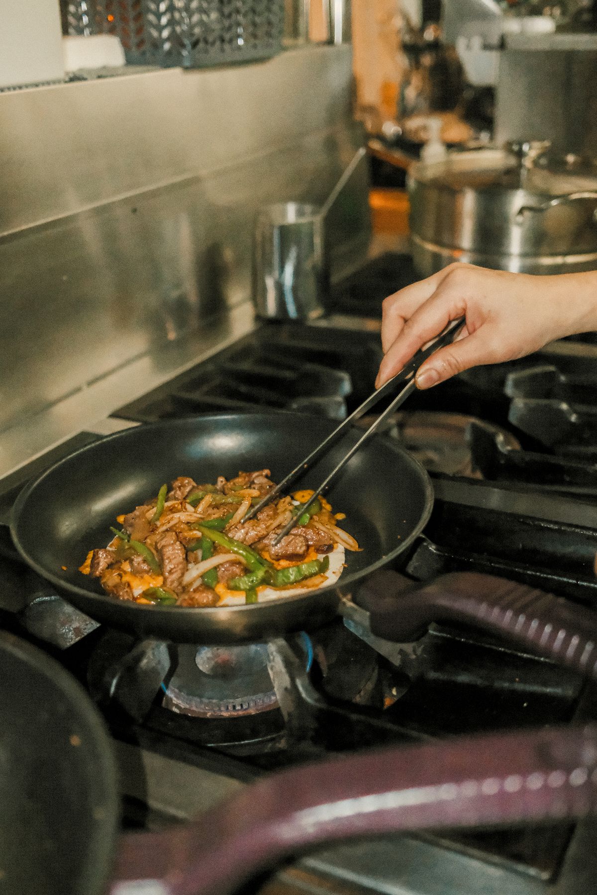 Thinly sliced beef searing for a home kitchen stir fry