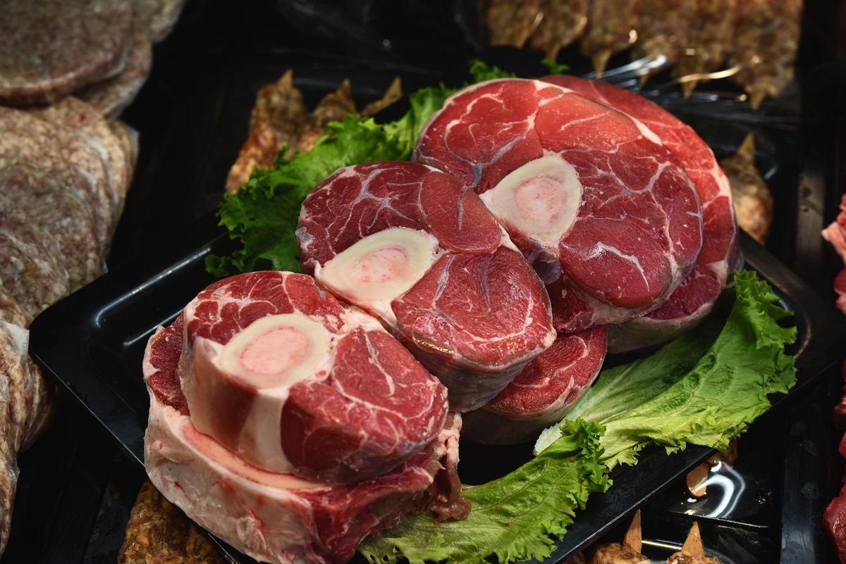 Braised veal osso buco in a rich sauce with gremolata
