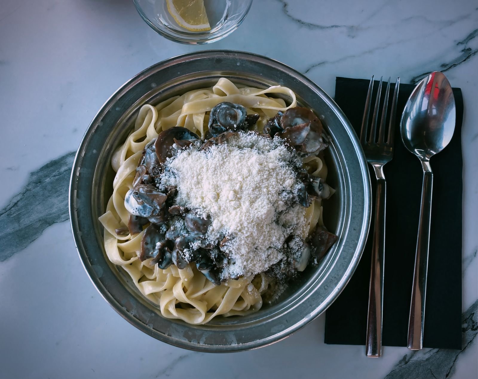 Veal and porcini white ragu tossed through tagliatelle with Parmesan